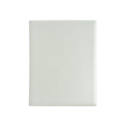 Matte off-white tile sample by Clay Imports, a rectangular tile with slightly rounded edges and subtle texture.
