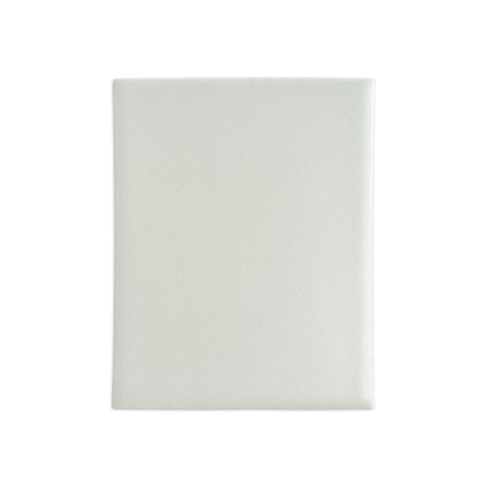 Matte off-white tile sample by Clay Imports, a rectangular tile with slightly rounded edges and subtle texture.