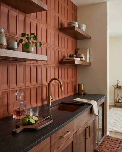 Mamey Inversa Bota textured wall tiles by Clay Imports as a reddish-brown backsplash in a home bar.
