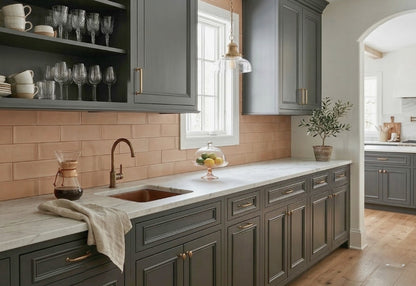 Bota Opaque 4x8 Artist Series subway tiles by Clay Imports, featuring a warm muted orange hue as a kitchen backsplash.