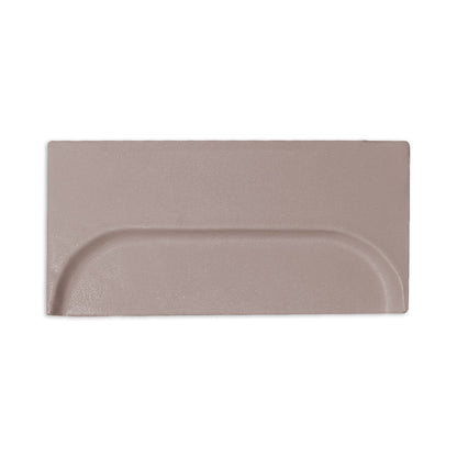Brown Oval Boot clay tile by Clay Imports featuring a raised, rounded oval design on one side.