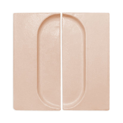 Two sandy beige rectangular clay tiles with oval recesses by Clay Imports, featuring a subtle textured surface.