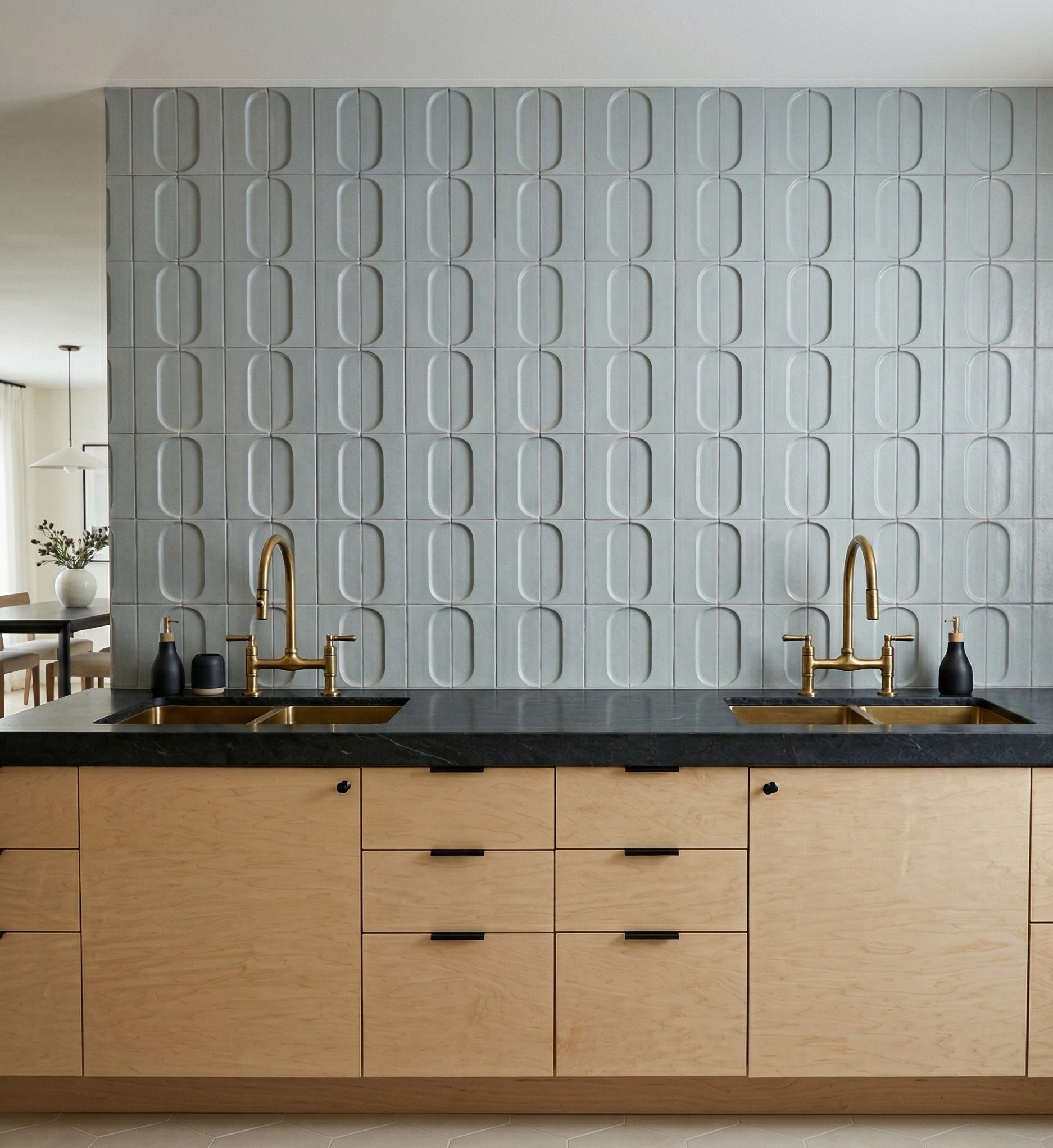 Gray Oval Spur clay tiles by Clay Imports, forming a modern kitchen backsplash above wood cabinets.