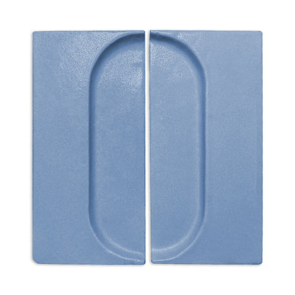Denim blue oval shape clay tile by Clay Imports, featuring two rectangular tiles with recessed oval designs and a textured surface.