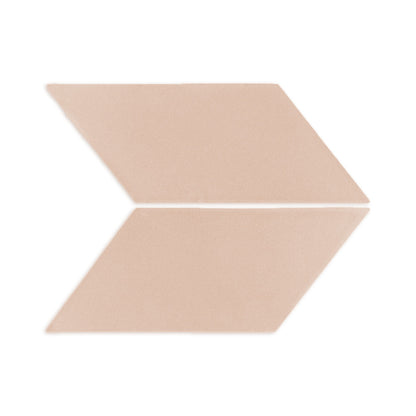 Two sand-colored parallelogram clay tiles by Clay Imports, arranged horizontally forming a right-pointing arrow, with a subtle grainy texture.