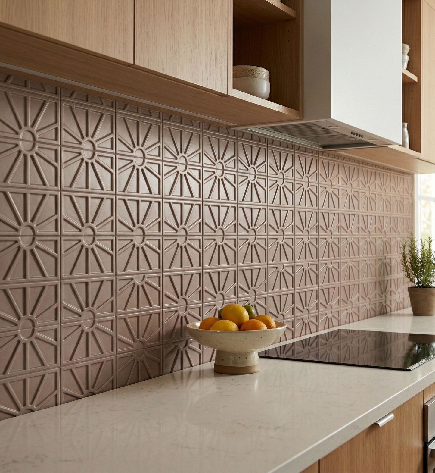 Petalito Boot brown clay tile by Clay Imports, featuring an embossed sunburst pattern as a kitchen backsplash.