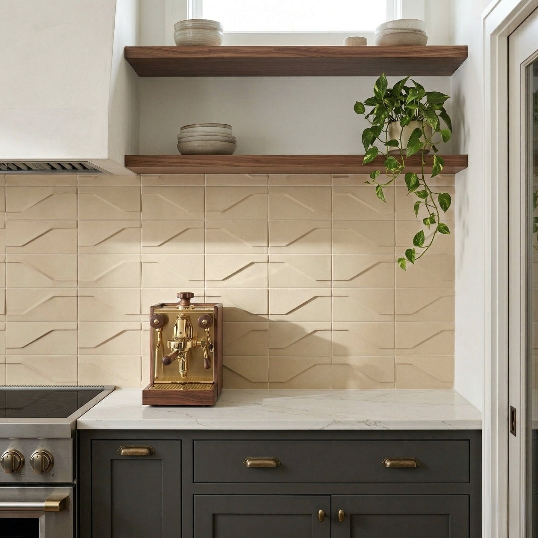 Cream Templo Twig clay tiles by Clay Imports featuring an embossed zig-zag pattern on a kitchen backsplash.