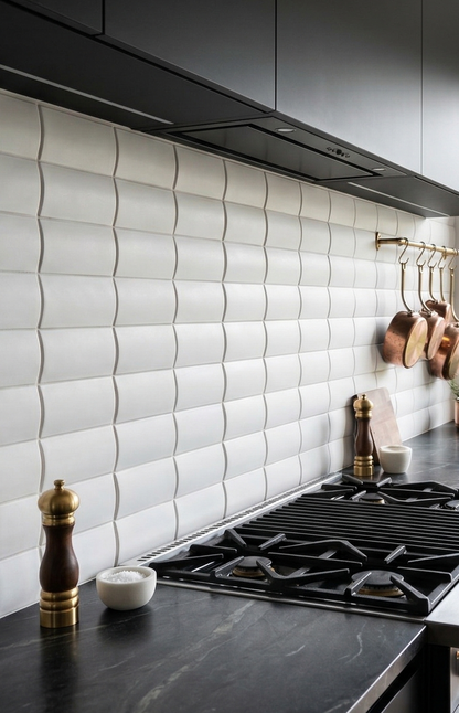 White clay tiles by Clay Imports with a curved, wavy texture on a modern kitchen backsplash.