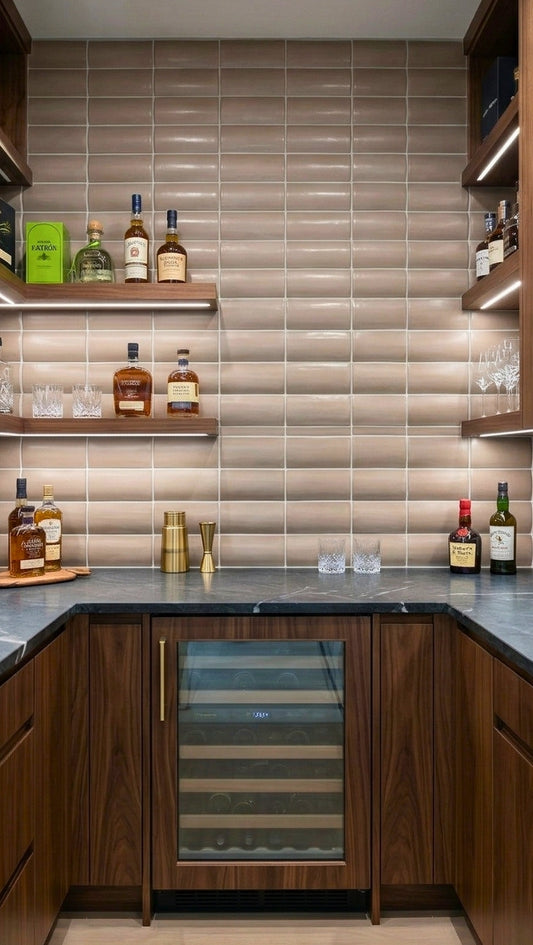 Elongated, curved taupe clay tiles by Clay Imports form a textured backsplash in a modern bar.