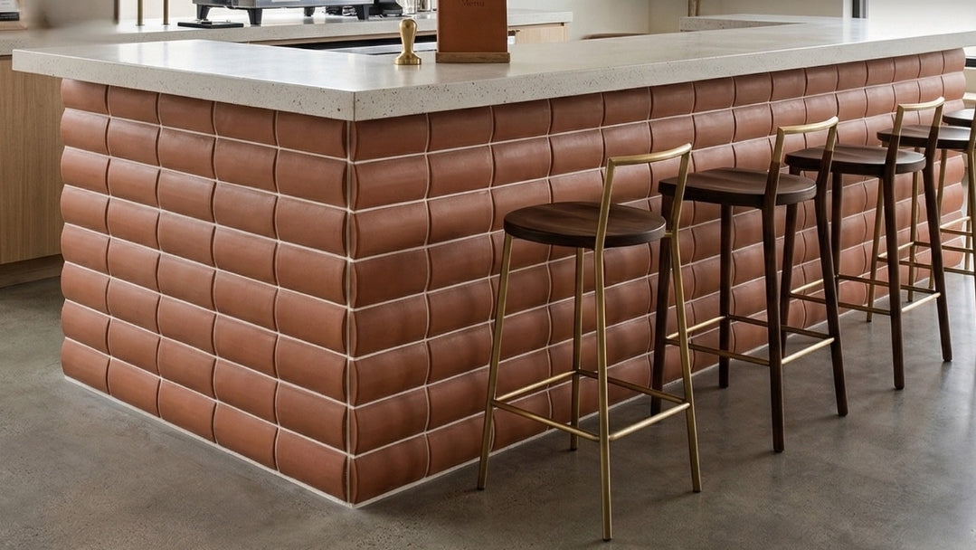 Mamey rounded clay tile by Clay Imports, featuring white horizontal grout.