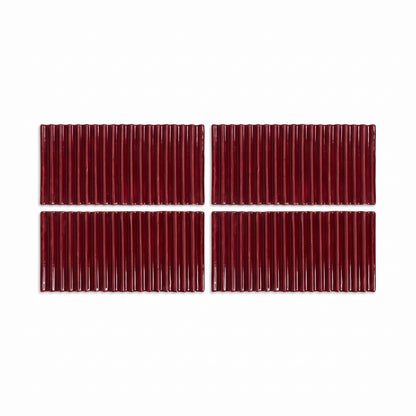 Four rectangular dark red ribbed tiles arranged in a 2x2 grid on a plain white background.