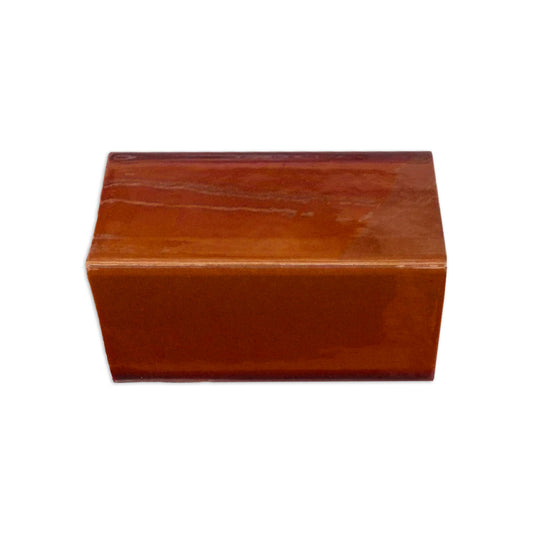 Glossy Root Beer V Cap Solid Tile Trim by Clay Imports, a single reddish-brown piece.