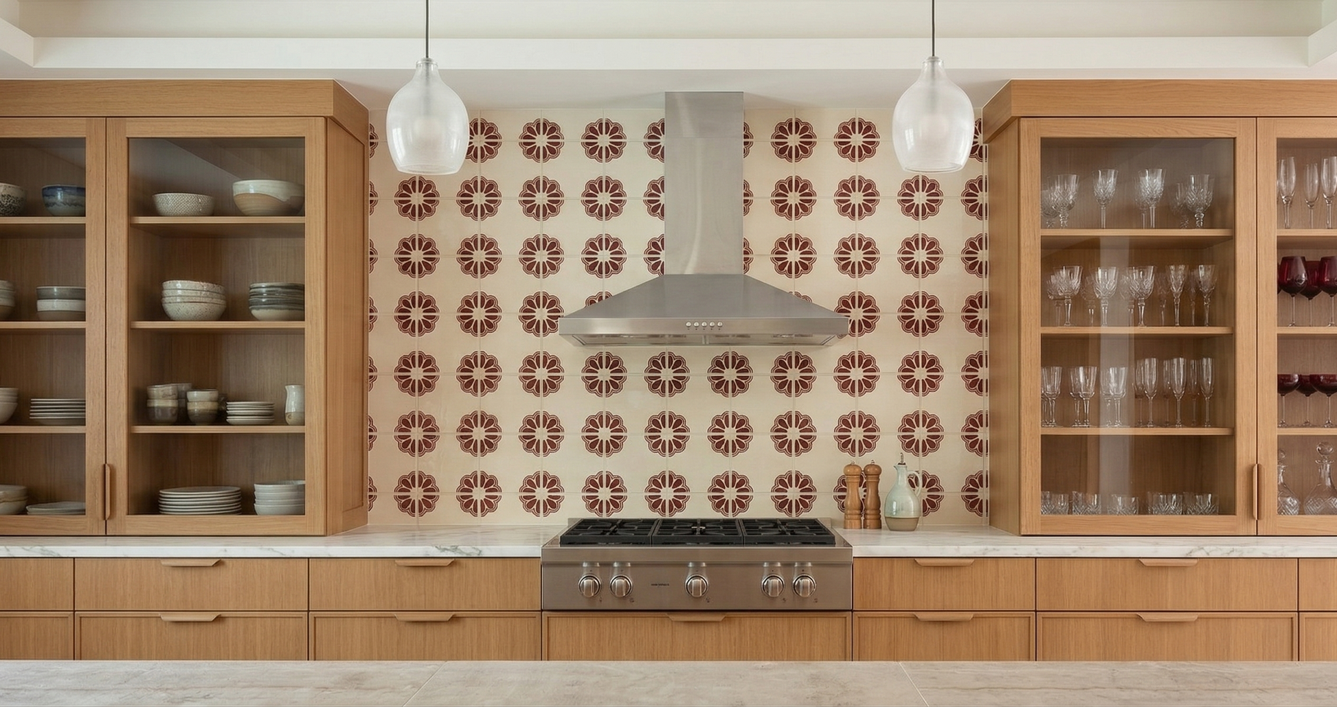Traditional Talavera tile with an oxblood floral pattern by Clay Imports Handmade Tile, installed as a kitchen backsplash.