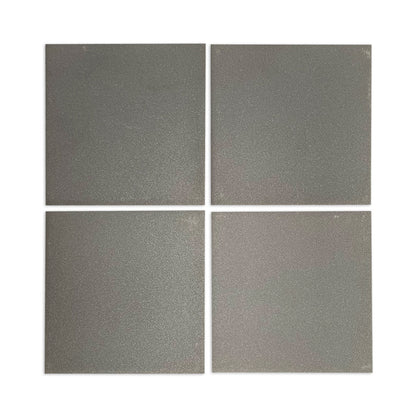 Four dark green-grey square clay tiles by Clay Imports arranged in a grid with a fine, granular texture.