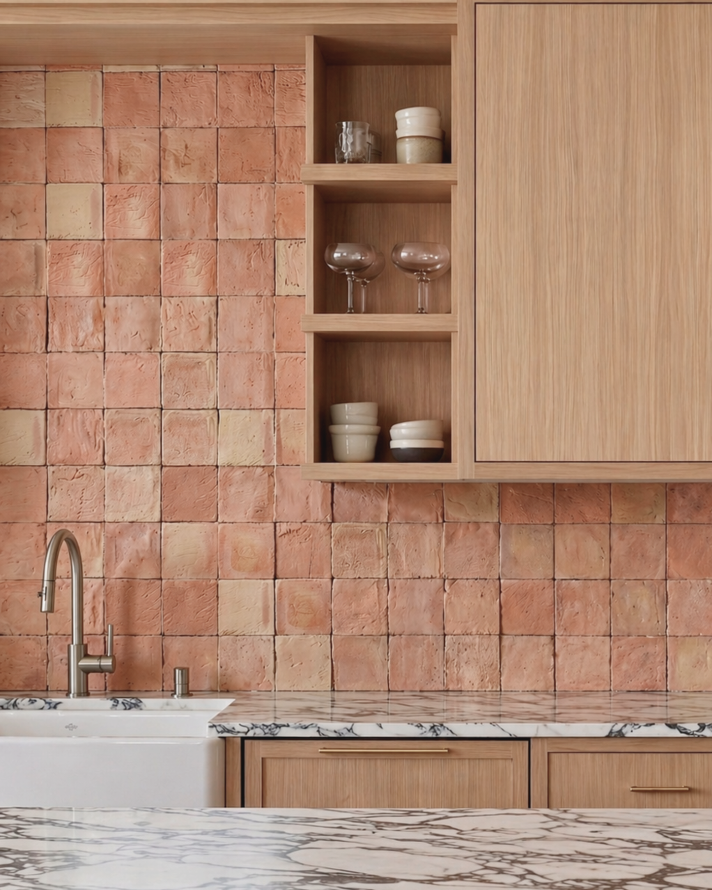 Antique Matte 4x4 terracotta tile by Clay Imports, with a rustic, varied texture, installed as a kitchen backsplash.