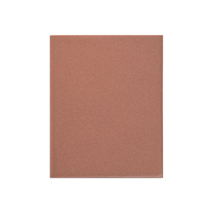 Reddish-brown matte lava rock sample by Clay Imports showing a fine granular texture.