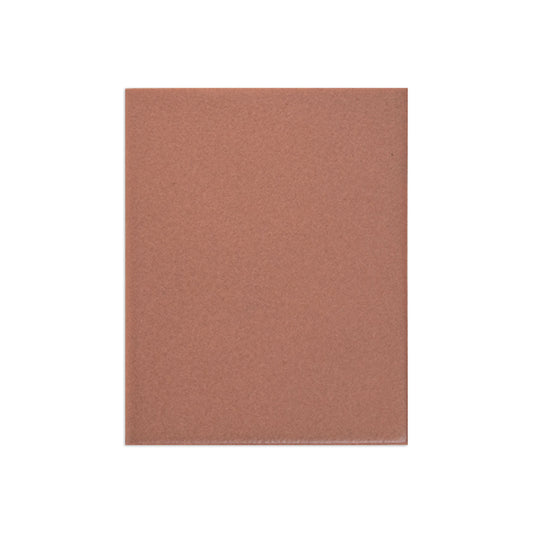 Reddish-brown matte lava rock sample by Clay Imports showing a fine granular texture.