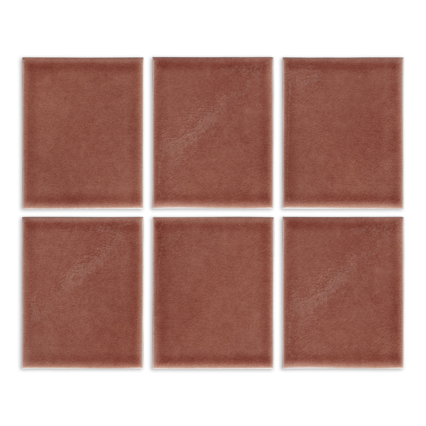 Tamarindo glossy solid tiles by Clay Imports with a subtle crackled texture, arranged in a grid.