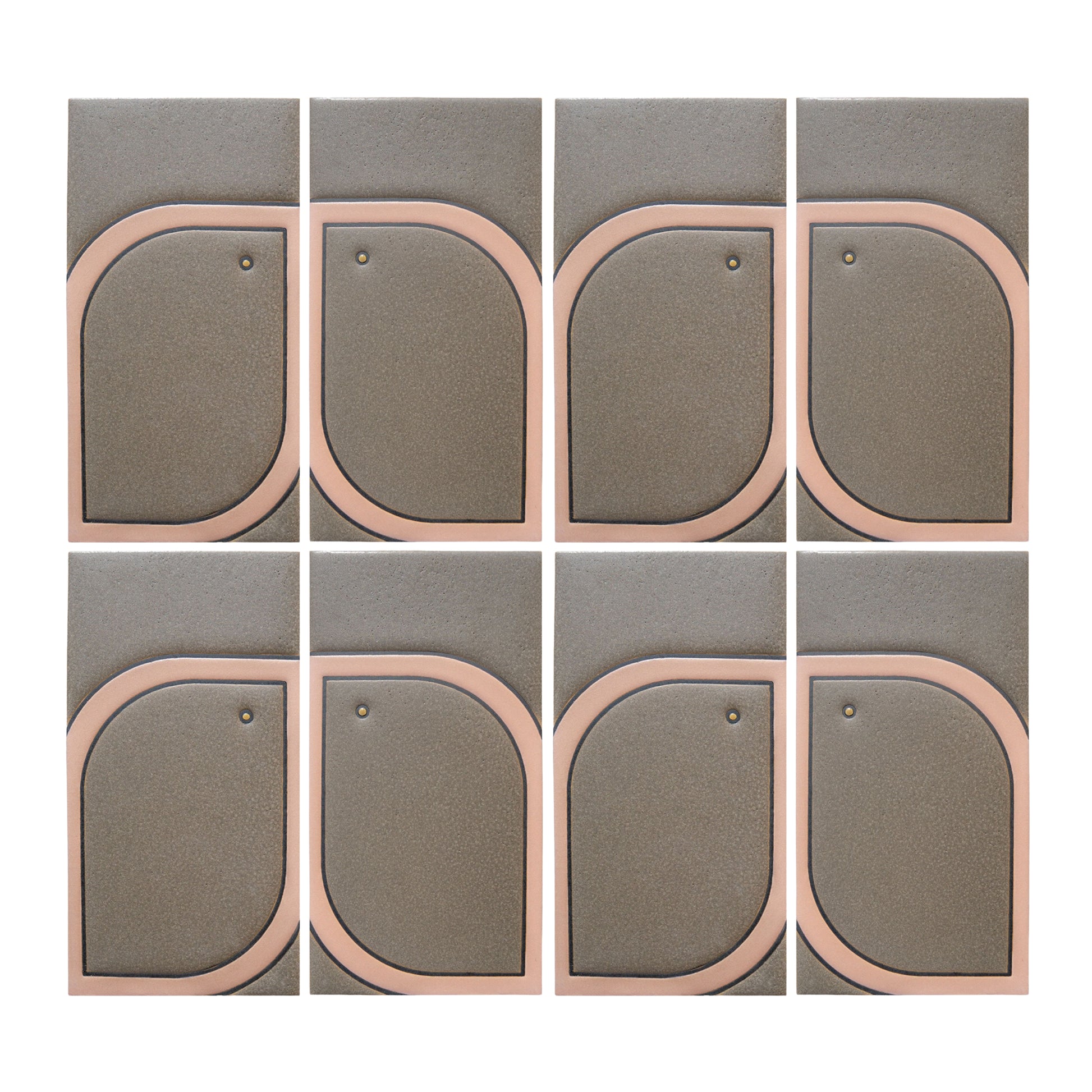 Eight textured grey-brown tiles by Clay Imports, arranged in a grid with peach-pink rounded geometric patterns and gold studs.