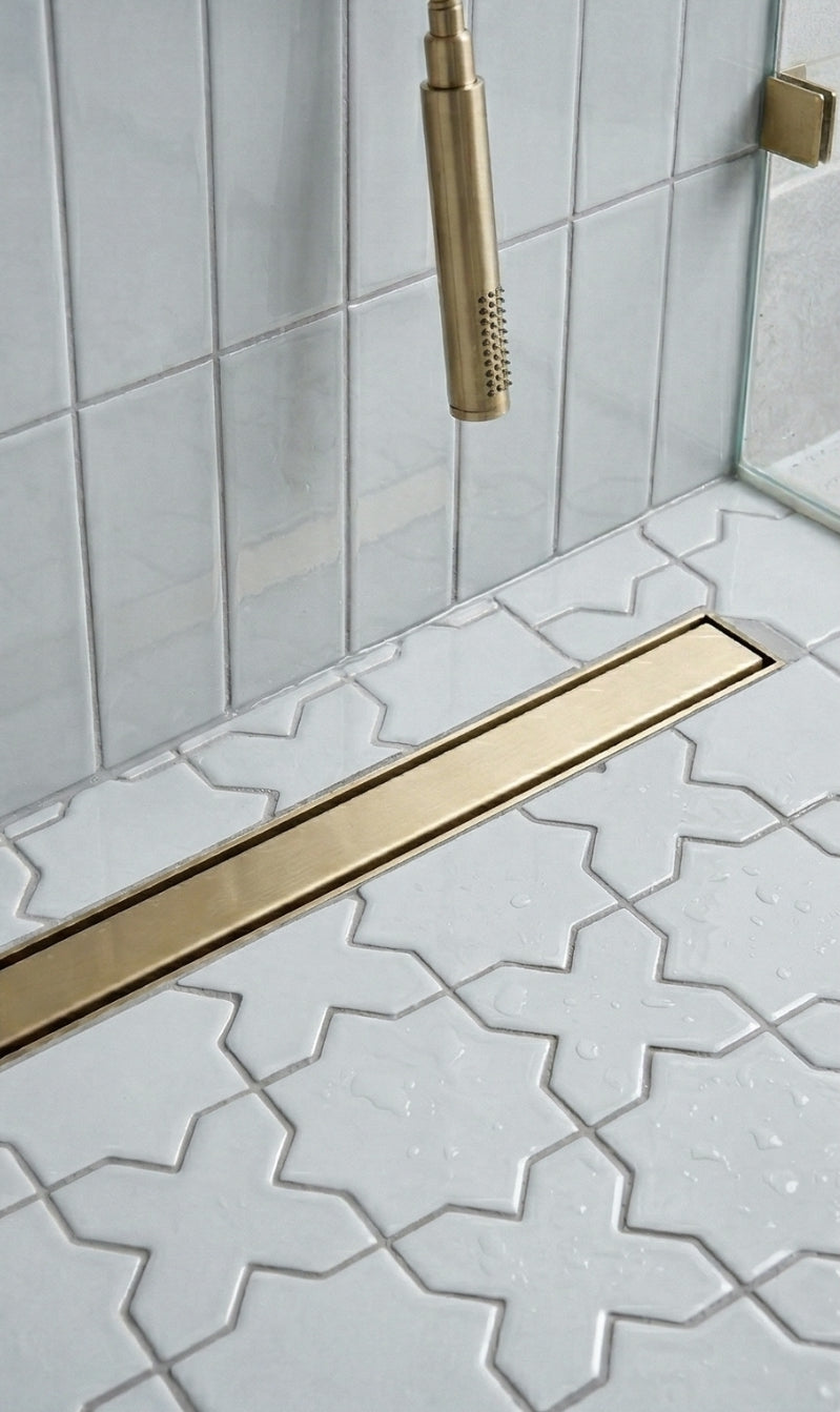 Spearmint 3x12 solid tile by Clay Imports on a shower wall with a glossy finish.