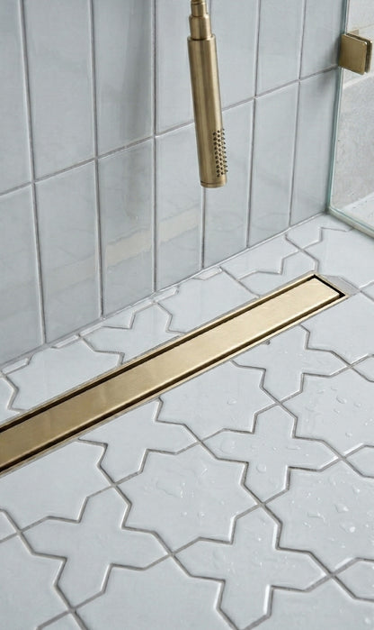 Spearmint 3x12 solid tile by Clay Imports on a shower wall with a glossy finish.