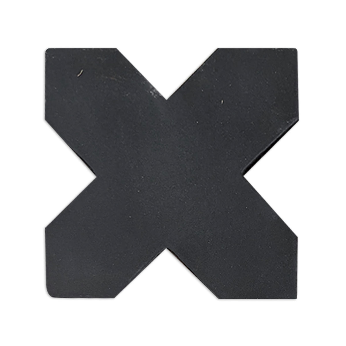 Black suede cross-shaped solid tile by Clay Imports, with a matte finish and subtle surface texture.
