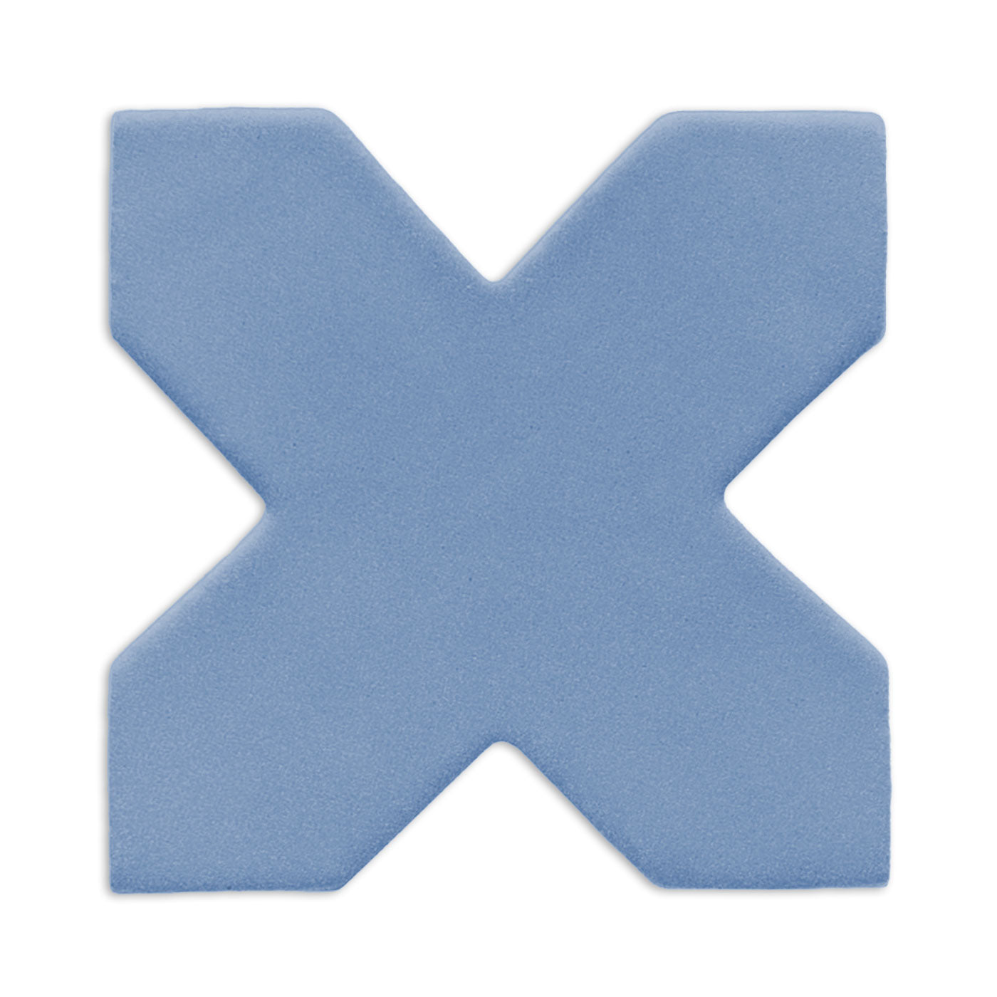 Denim blue X-shaped clay tile by Clay Imports with a subtle granular texture, casting a soft shadow.