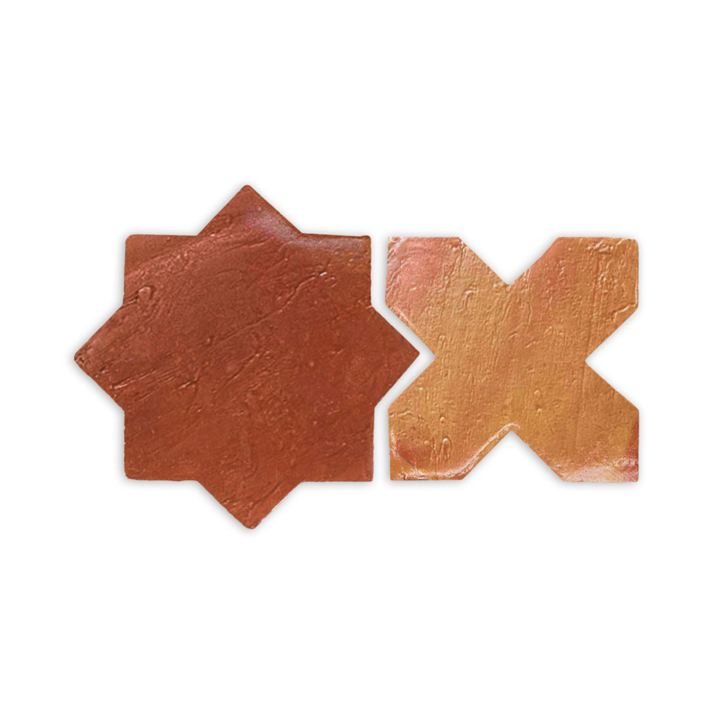 Terracotta star and cross tiles with an antique satin finish by Clay Imports, showing textured reddish-brown and golden-brown surfaces, casting a shadow.