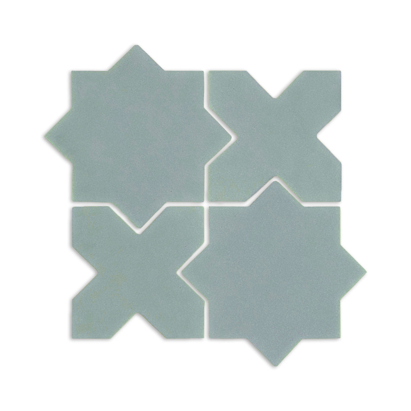 Light blue-green Star & Cross clay tiles by Clay Imports, arranged in a grid with a matte texture.