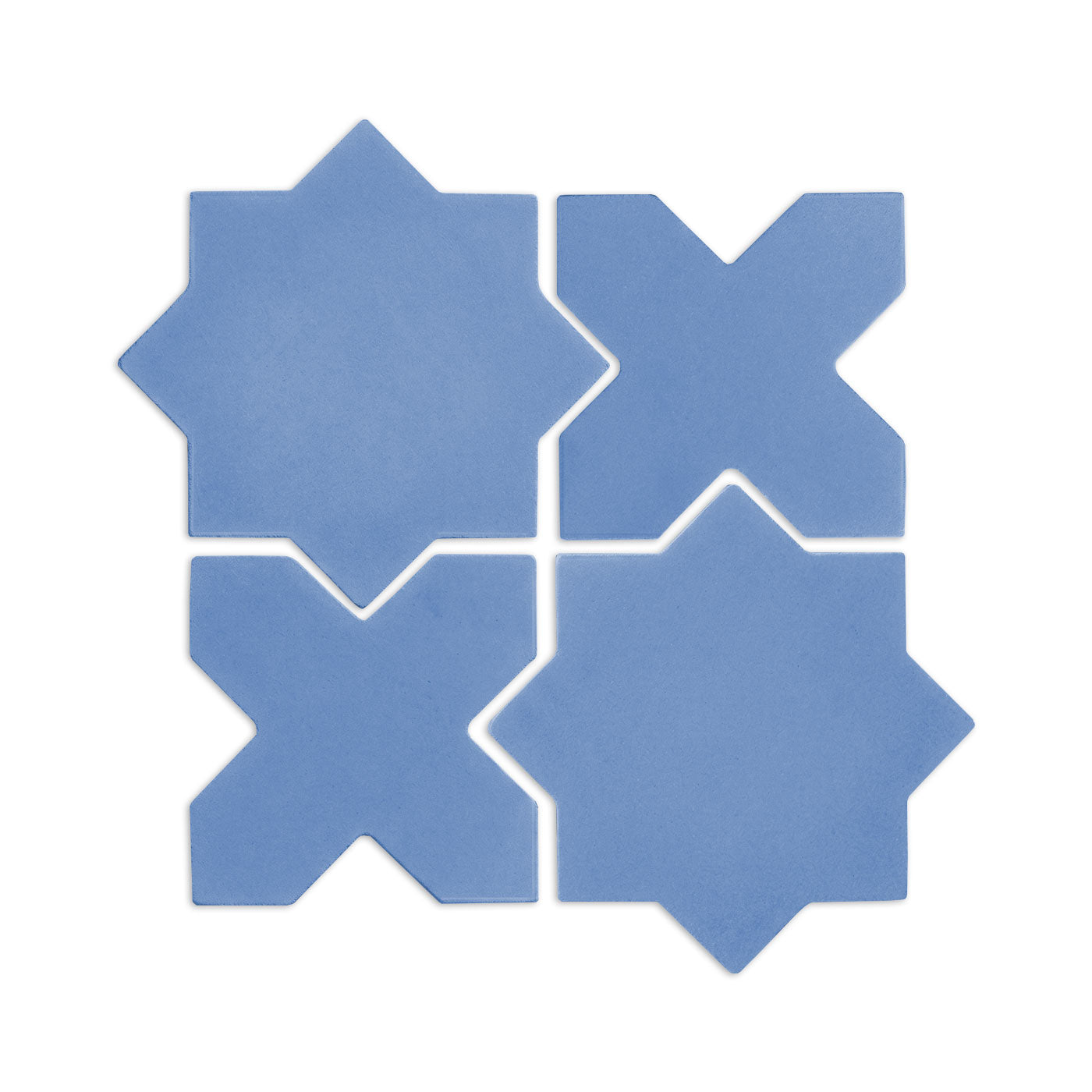 Denim blue star and cross clay tiles by Clay Imports, arranged in an interlocking square pattern on a white background.