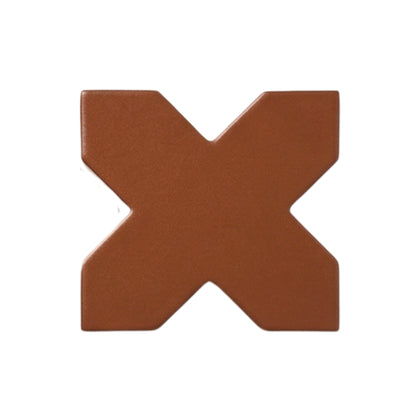 Brown cross-shaped tile sample by Clay Imports with a matte finish and subtle texture.