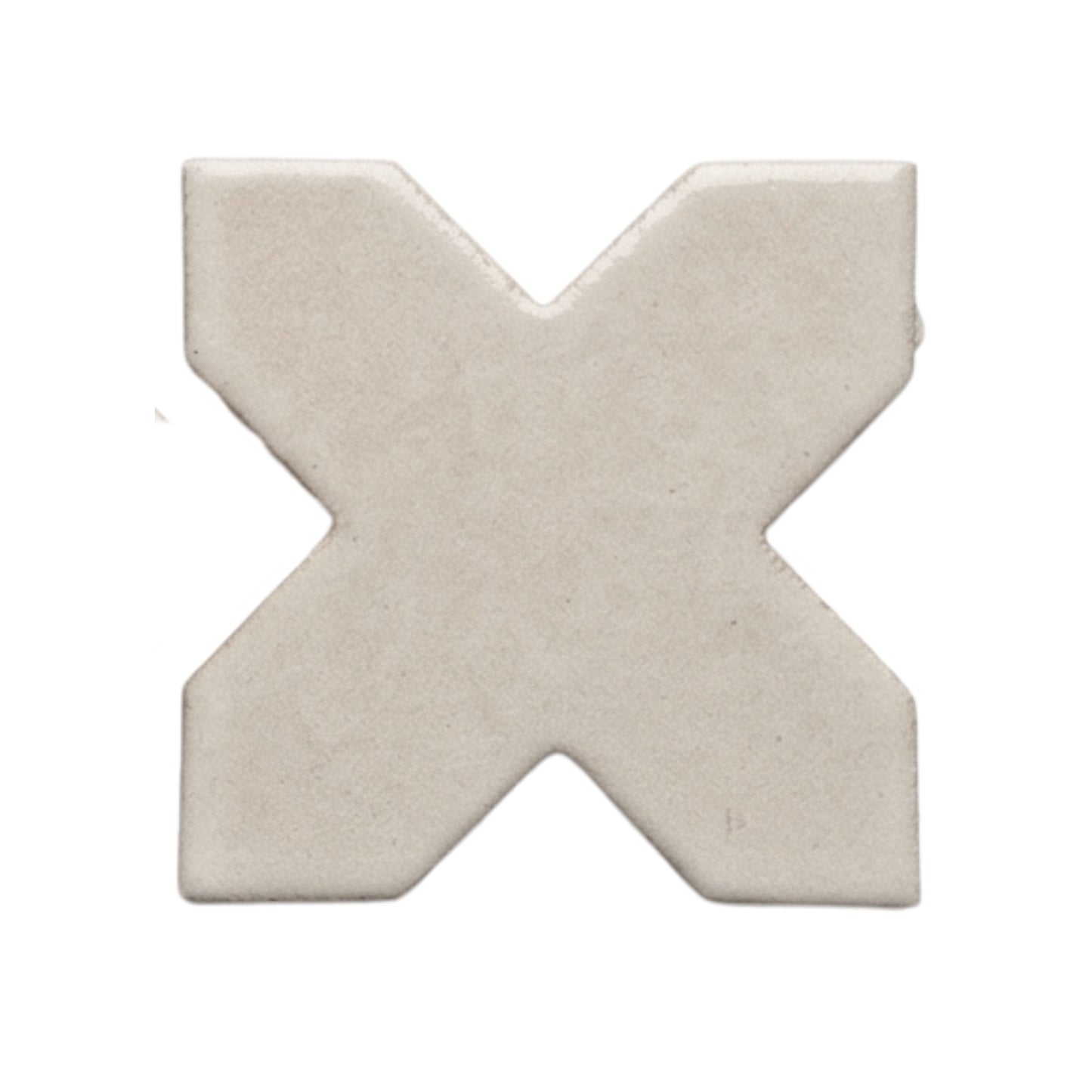 Light pearl-colored cross-shaped tile by Clay Imports with a matte finish.