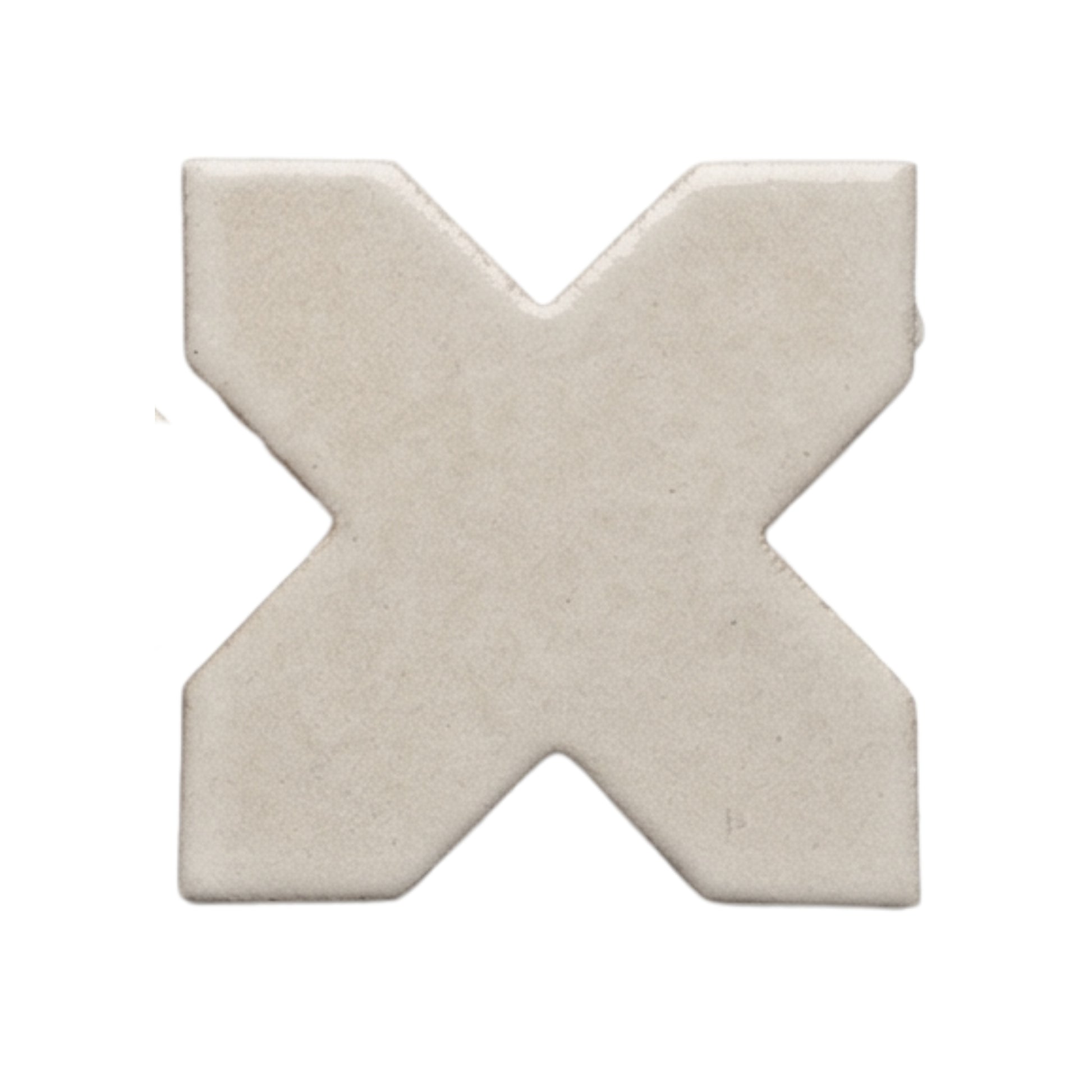 Light pearl-colored cross-shaped tile by Clay Imports with a matte finish.