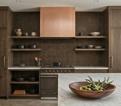 Saddle Star & Cross clay tile from Clay Imports, creating a decorative kitchen backsplash.