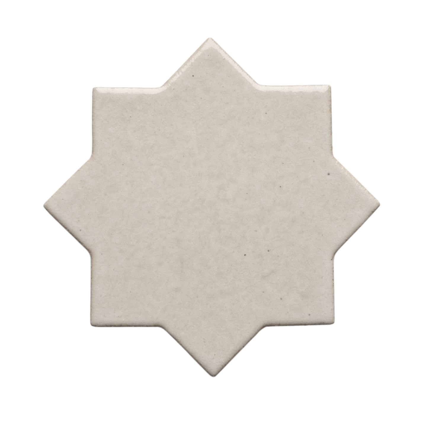 Pearl Snap star tile by Clay Imports, an 8-point geometric shape with a textured off-white finish.