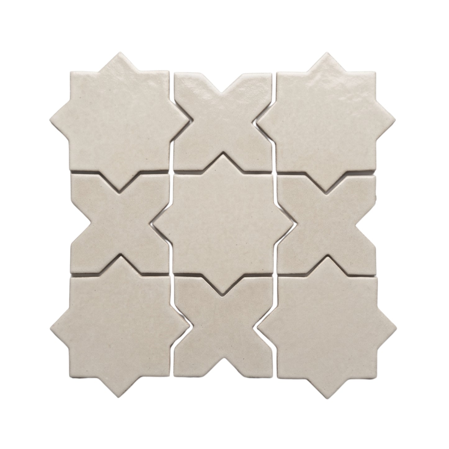 Pearl Snap Star & Cross mosaic tiles by Clay Imports, displaying a matte, textured finish.