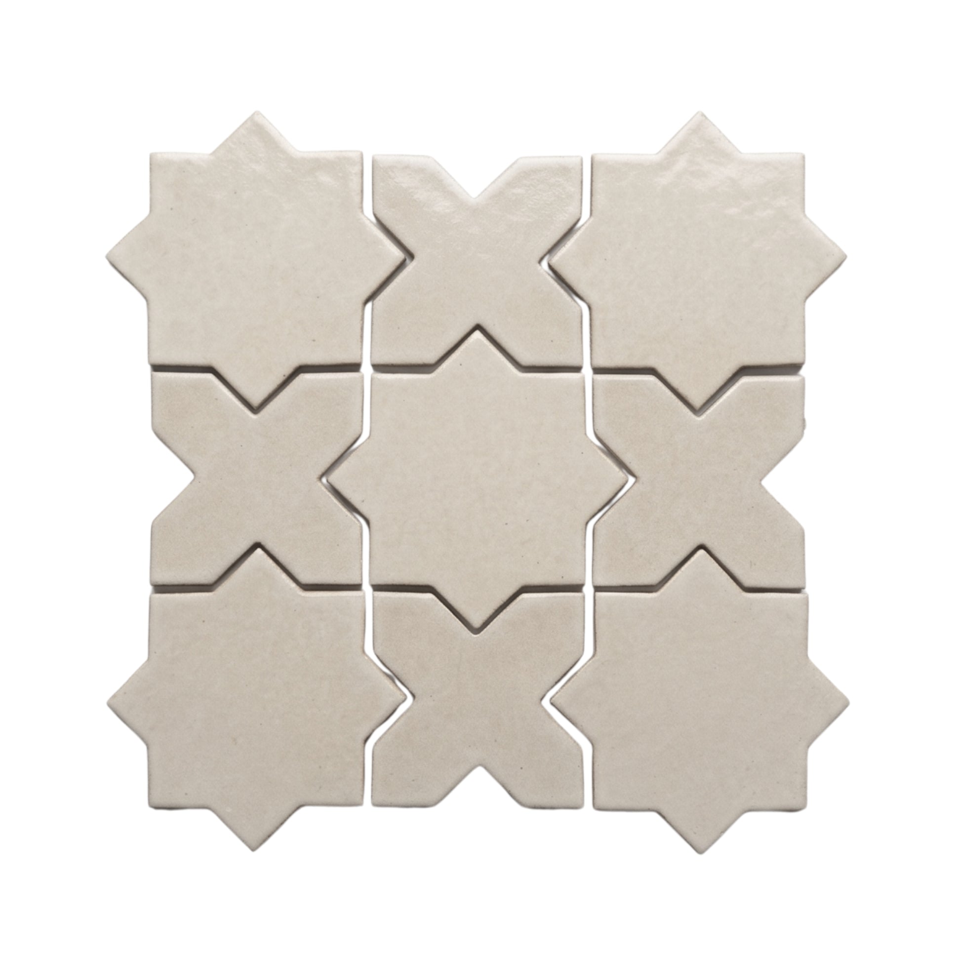 Pearl Snap Star & Cross mosaic tiles by Clay Imports, displaying a matte, textured finish.