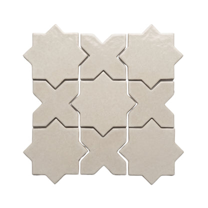 Pearl Snap Star & Cross mosaic tiles by Clay Imports, displaying a matte, textured finish.