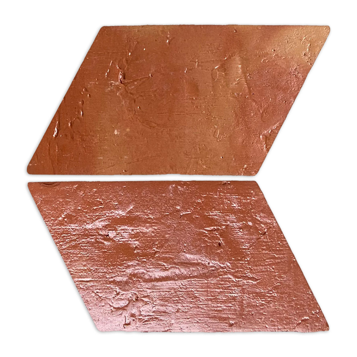 Two reddish-brown parallelogram terracotta tiles by Clay Imports, featuring an antique gloss and textured surface, angled right.