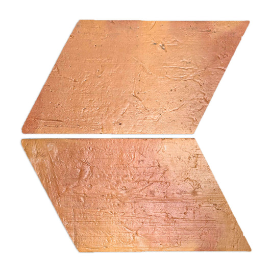 Terracotta parallelogram tile with an antique satin finish by Clay Imports, featuring a textured surface arranged as a left-pointing chevron.