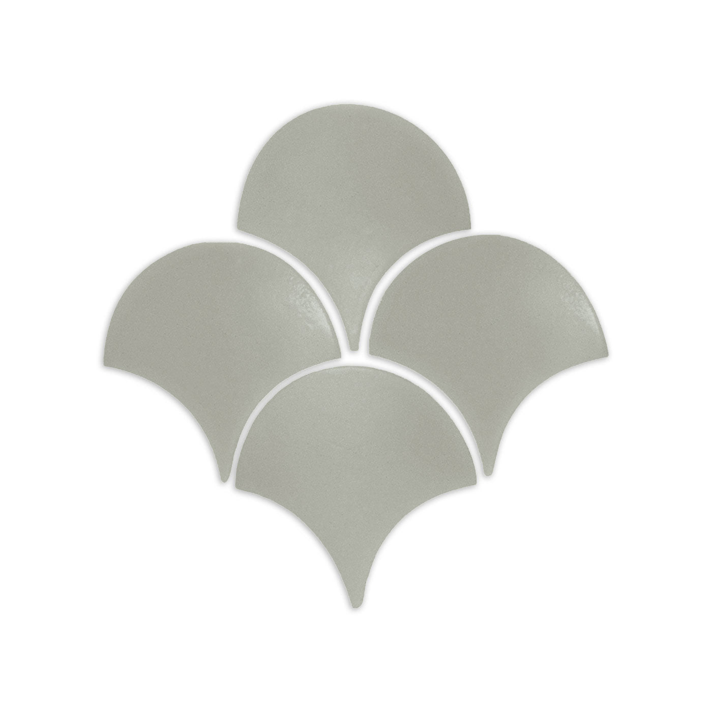 Agave green fan shape clay tile by Clay Imports, arranged in a scalloped pattern on a white background.