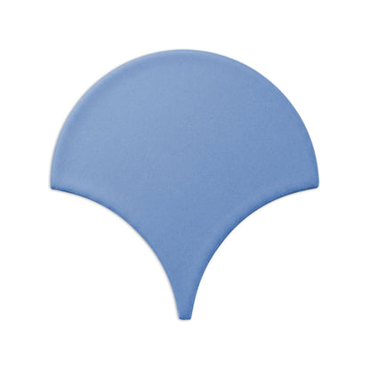 Denim blue Abanico clay tile by Clay Imports, with a curved top edge and pointed base.