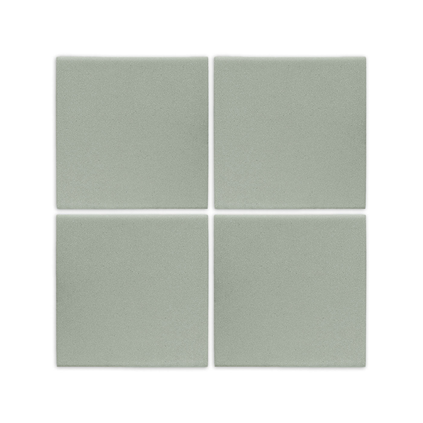 Agave 6x6 clay tile by Clay Imports, with a matte sage green texture, shown as four square pieces.