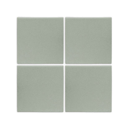 Agave 6x6 clay tile by Clay Imports, with a matte sage green texture, shown as four square pieces.