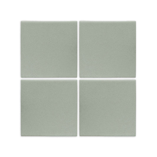 Agave 6x6 clay tile by Clay Imports, with a matte sage green texture, shown as four square pieces.