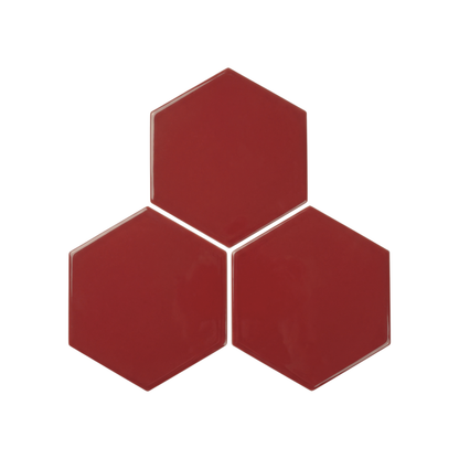 Three glossy hexagonal tiles in a deep red color, arranged in a triangular cluster on a plain white background.