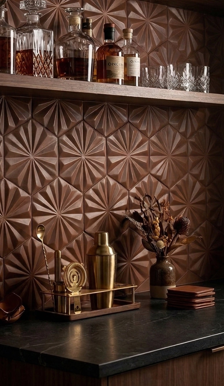 Cacao-colored hexagonal solid tiles by Clay Imports with a 3D fan pattern, forming a stylish bar backsplash.