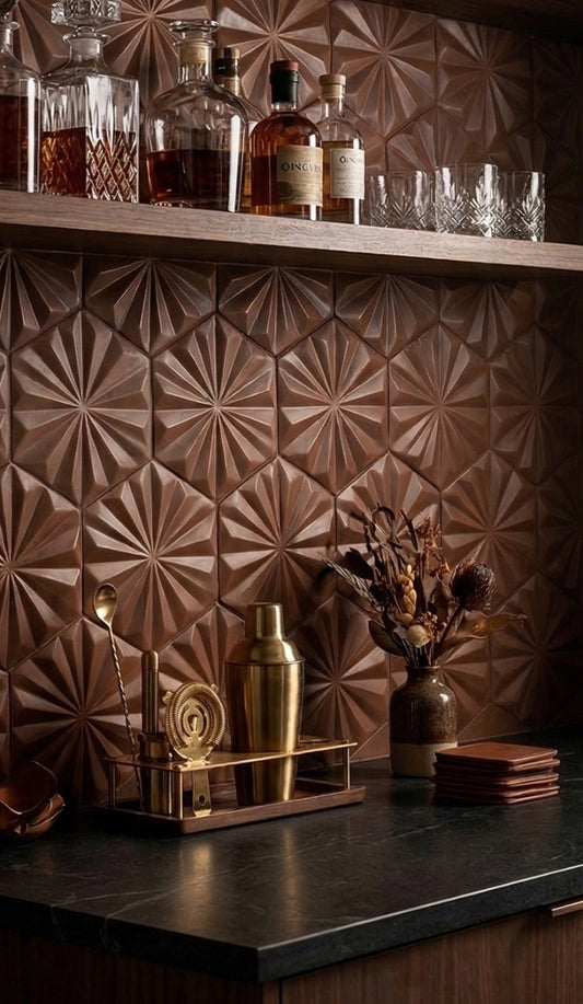 Cacao-colored hexagonal solid tiles by Clay Imports with a 3D fan pattern, forming a stylish bar backsplash.