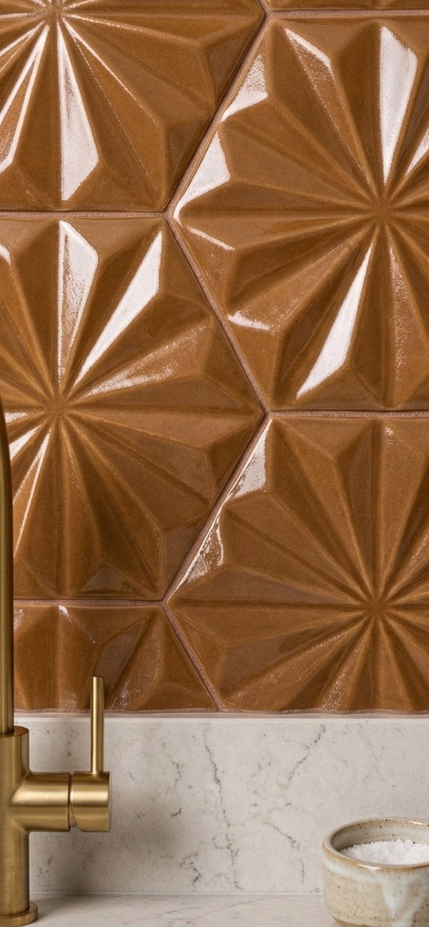 Brown glossy hexagonal solid tile by Clay Imports with a geometric starburst pattern, installed as a kitchen backsplash.