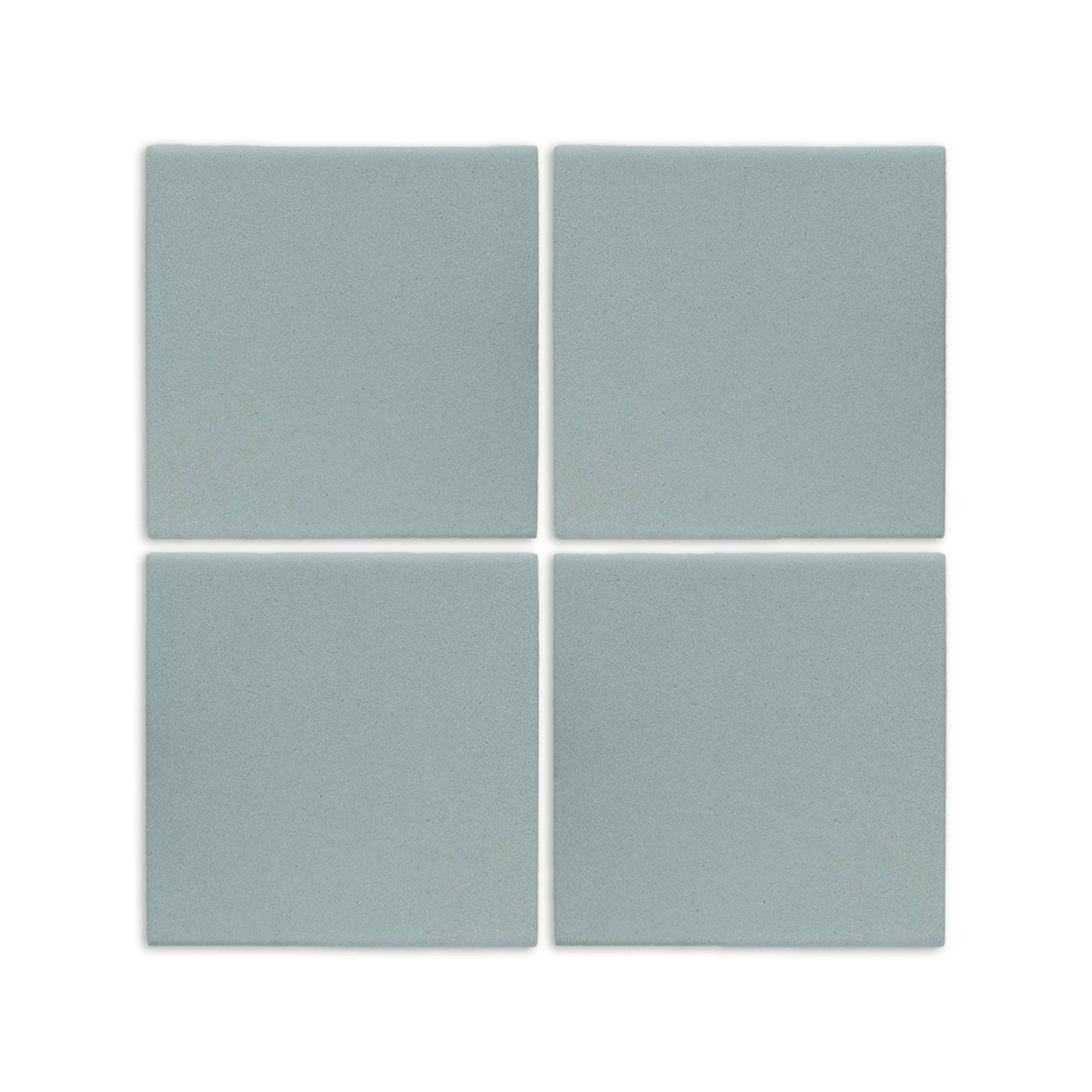 Four light blue-grey 6x6 clay tiles by Clay Imports, arranged in a grid with a subtle speckled matte finish.